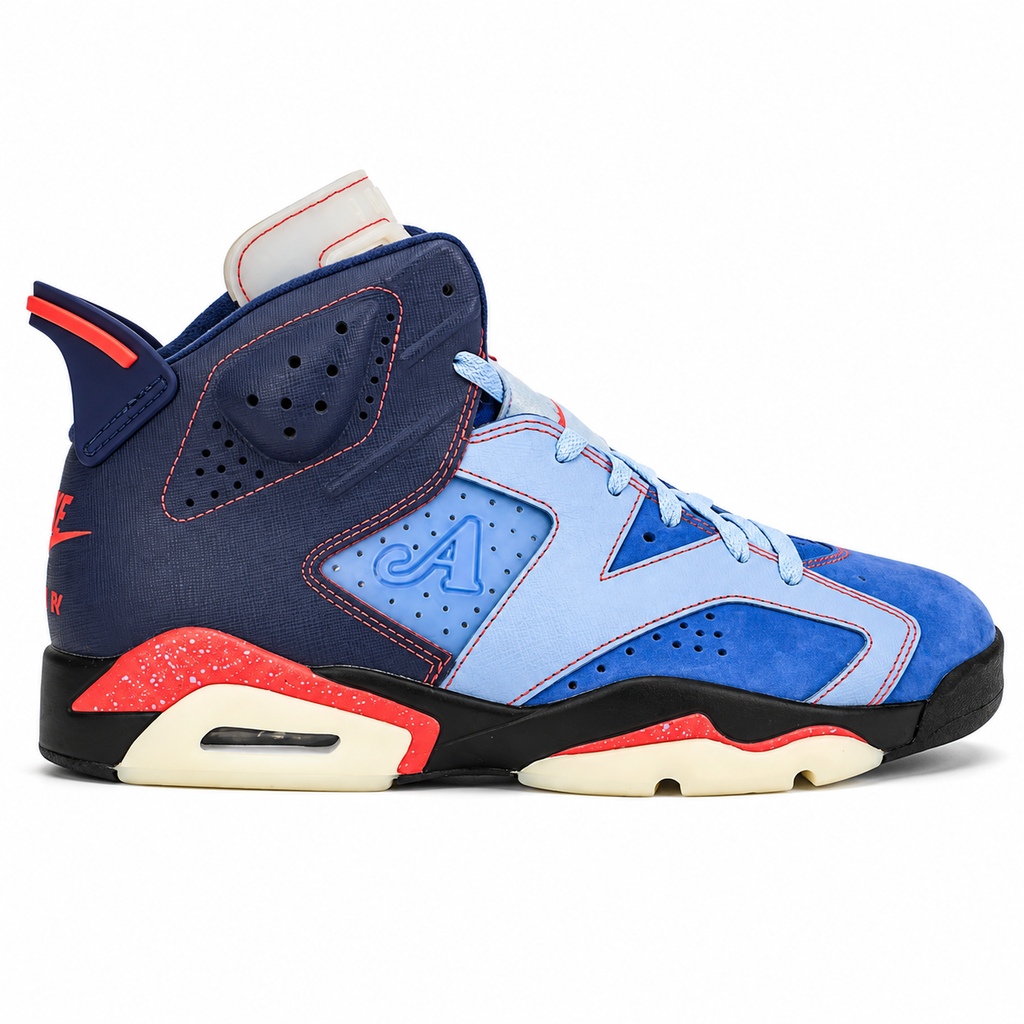 A Nike Air Jordan 6 Retro High sneaker in a blue colorway, featuring navy, light blue, royal blue, and red accents with a cream midsole.