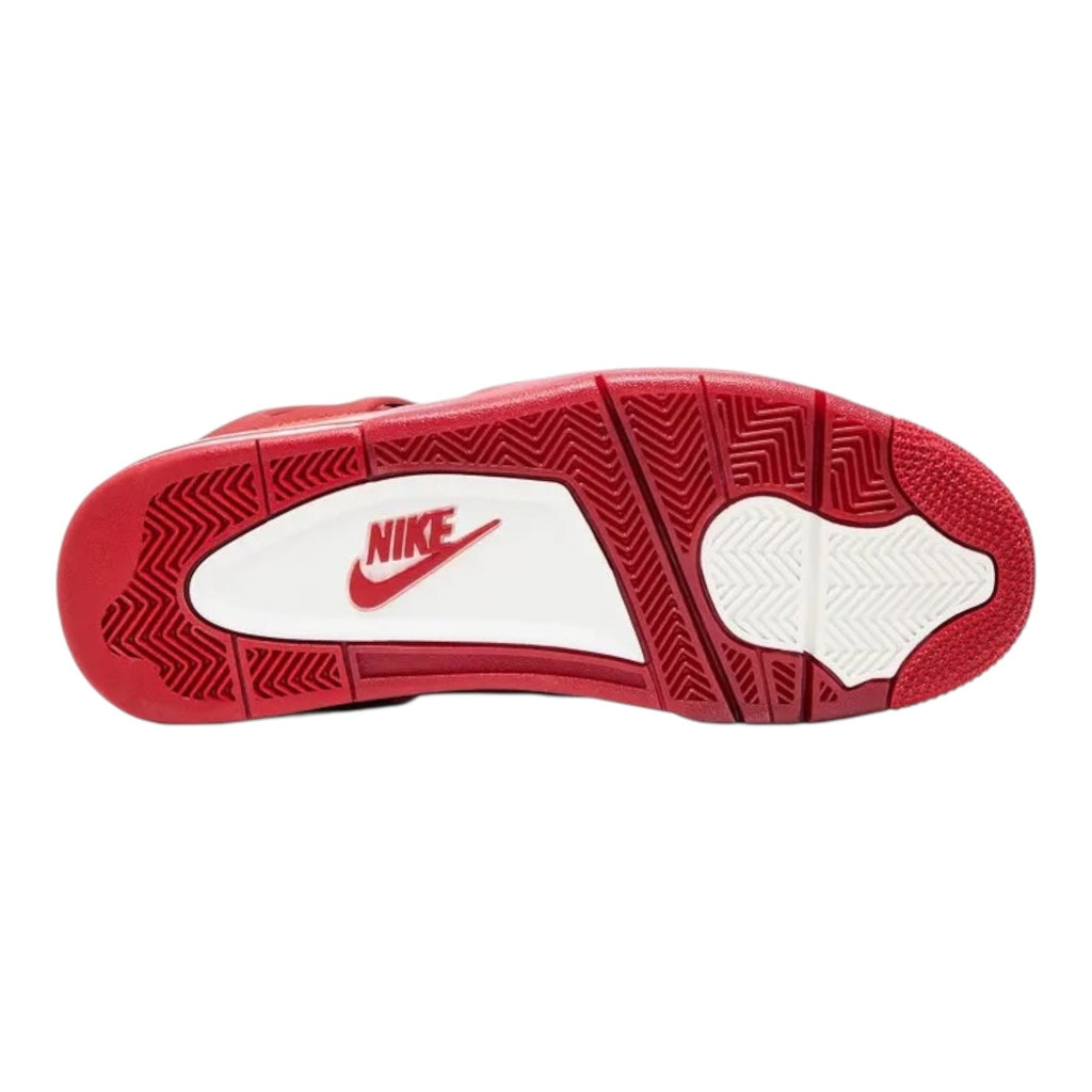 Red and white Nike shoe sole on a white background
