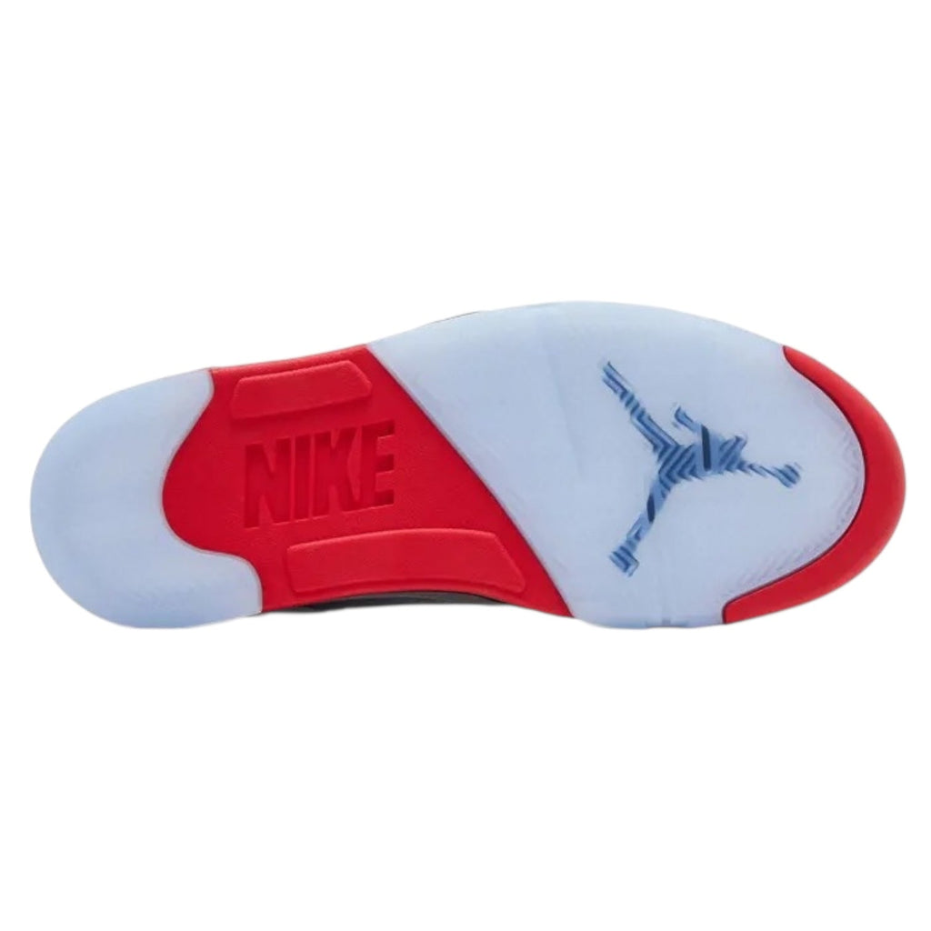 Nike shoe sole with red and white design on a white background
