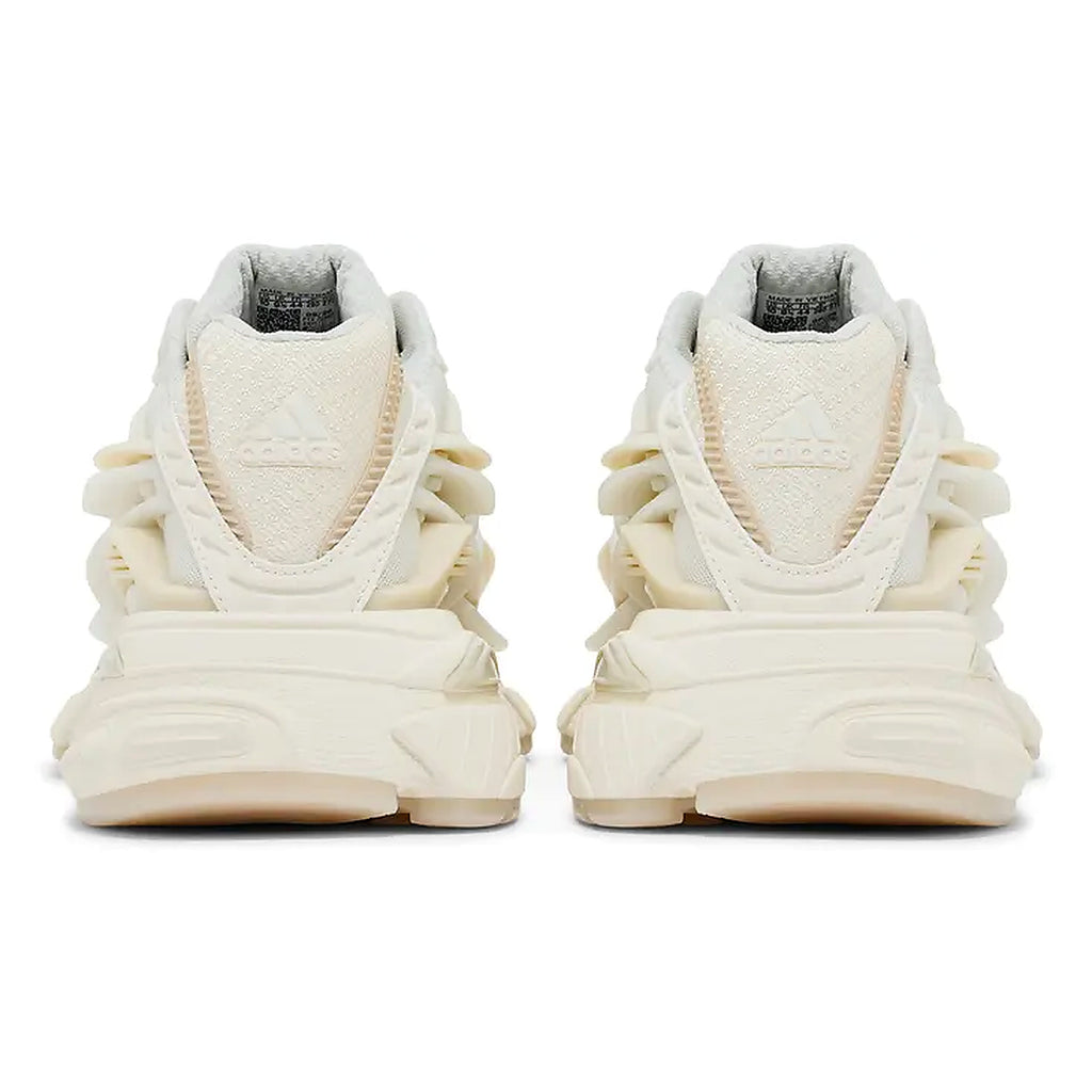 A pair of Adidas chunky sneakers shown from the back, featuring a cream and off-white colorway with textured layered details and the Adidas logo embossed on the heel.